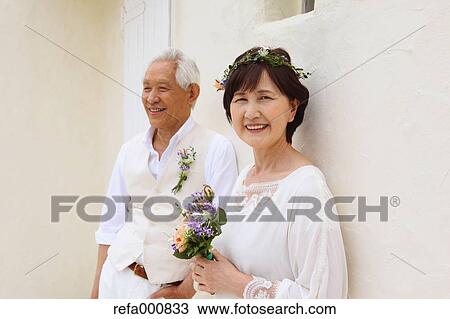 Senior adult Japanese couple celebrating View Large Photo Image Stock Image - Senior adult Japanese couple celebrating. Fotosearch