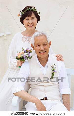 Senior adult Japanese couple celebrating View Large Photo Image Stock Image - Senior adult Japanese couple celebrating. Fotosearch