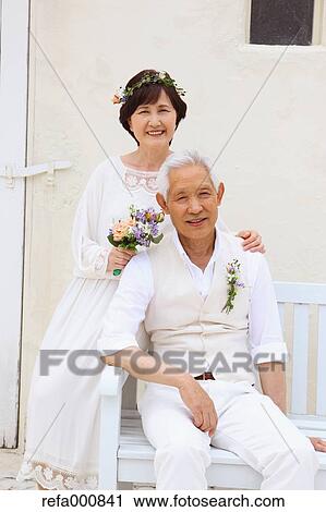 Senior adult Japanese couple celebrating View Large Photo Image Stock Image - Senior adult Japanese couple celebrating. Fotosearch