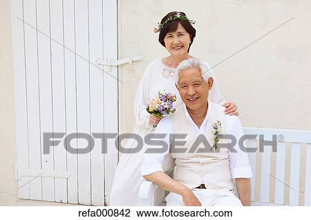 Senior adult Japanese couple celebrating View Large Photo Image Stock Image - Senior adult Japanese couple celebrating. Fotosearch