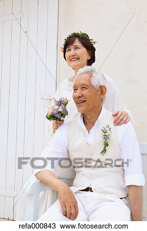 Senior adult Japanese couple celebrating View Large Photo Image Stock Image - Senior adult Japanese couple celebrating. Fotosearch