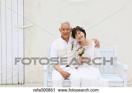 Senior adult Japanese couple celebrating View Large Photo Image Stock Image - Senior adult Japanese couple celebrating. Fotosearch