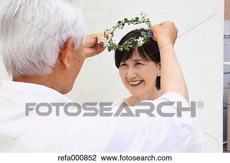 Senior adult Japanese couple celebrating View Large Photo Image Stock Image - Senior adult Japanese couple celebrating. Fotosearch