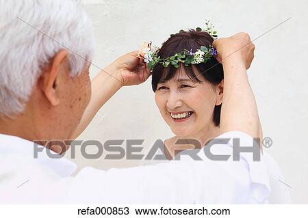 Senior adult Japanese couple celebrating View Large Photo Image Stock Image - Senior adult Japanese couple celebrating. Fotosearch
