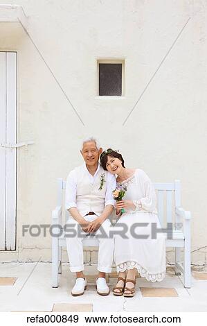 Senior adult Japanese couple celebrating View Large Photo Image Stock Photo - Senior adult Japanese couple celebrating. Fotosearch