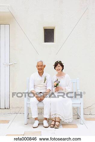Senior adult Japanese couple celebrating View Large Photo Image Stock Photograph - Senior adult Japanese couple celebrating. Fotosearch