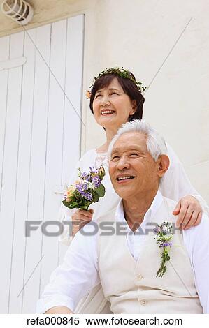 Senior adult Japanese couple celebrating View Large Photo Image Stock Photography - Senior adult Japanese couple celebrating. Fotosearch