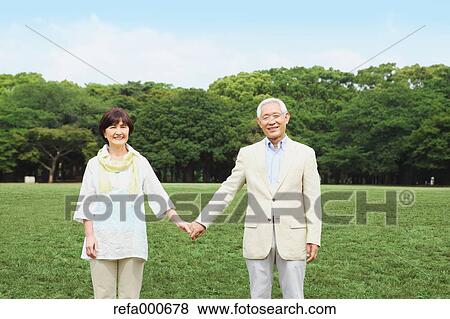 Senior adult Japanese couple in a park View Large Photo Image Stock Photo - Senior adult Japanese couple in a park. Fotosearch
