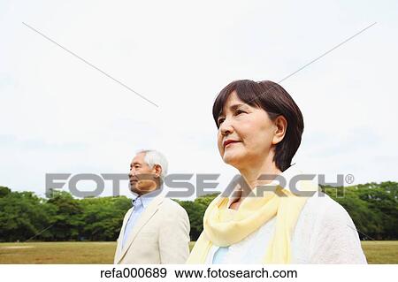 Senior adult Japanese couple in a park View Large Photo Image Stock Photo - Senior adult Japanese couple in a park. Fotosearch