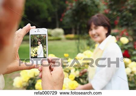 Senior adult Japanese couple in a park View Large Photo Image Stock Photo - Senior adult Japanese couple in a park. Fotosearch