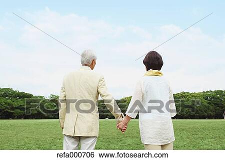 Senior adult Japanese couple in a park View Large Photo Image Stock Photograph - Senior adult Japanese couple in a park. Fotosearch