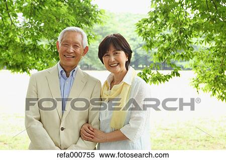Senior adult Japanese couple in a park View Large Photo Image Stock Photography - Senior adult Japanese couple in a park. Fotosearch