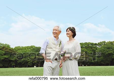 Senior adult Japanese couple in a park View Large Photo Image Stock Photography - Senior adult Japanese couple in a park. Fotosearch