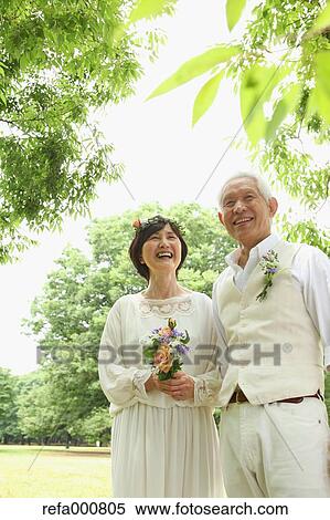 Senior adult Japanese couple in a park View Large Photo Image Stock Photography - Senior adult Japanese couple in a park. Fotosearch
