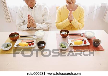 Senior adult Japanese couple in the kitchen View Large Photo Image Stock Image - Senior adult Japanese couple in the kitchen. Fotosearch