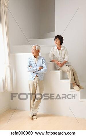 Senior adult Japanese couple in the living room View Large Photo Image Stock Image - Senior adult Japanese couple in the living room. Fotosearch