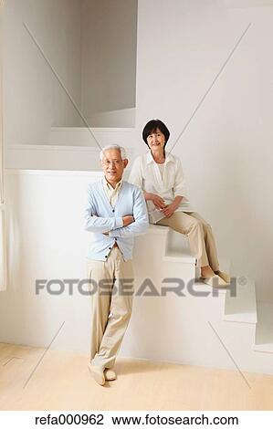 Senior adult Japanese couple in the living room View Large Photo Image Stock Image - Senior adult Japanese couple in the living room. Fotosearch