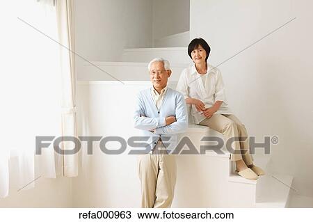 Senior adult Japanese couple in the living room View Large Photo Image Stock Image - Senior adult Japanese couple in the living room. Fotosearch