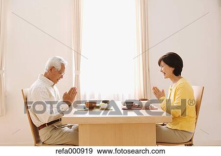 Senior adult Japanese couple in the kitchen View Large Photo Image Stock Photo - Senior adult Japanese couple in the kitchen. Fotosearch