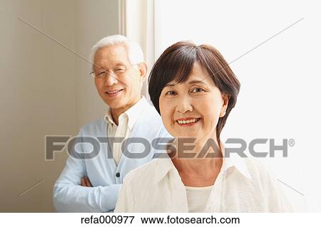 Senior adult Japanese couple in the living room View Large Photo Image Stock Photo - Senior adult Japanese couple in the living room. Fotosearch