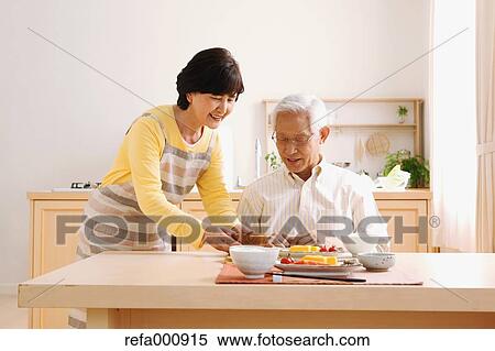 Senior adult Japanese couple in the kitchen View Large Photo Image Stock Photography - Senior adult Japanese couple in the kitchen. Fotosearch