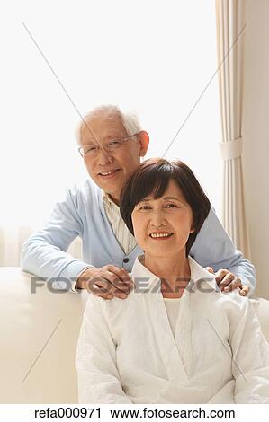 Senior adult Japanese couple on the sofa View Large Photo Image Stock Image - Senior adult Japanese couple on the sofa. Fotosearch