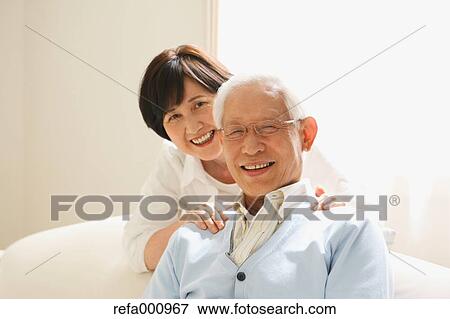 Senior adult Japanese couple on the sofa View Large Photo Image Stock Photo - Senior adult Japanese couple on the sofa. Fotosearch