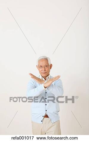 Senior adult Japanese man against white wall View Large Photo Image Stock Photo - Senior adult Japanese man against white wall. Fotosearch