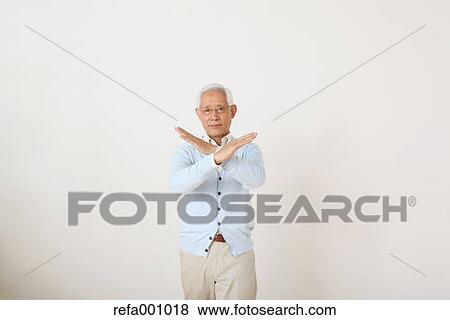 Senior adult Japanese man against white wall View Large Photo Image Stock Photo - Senior adult Japanese man against white wall. Fotosearch