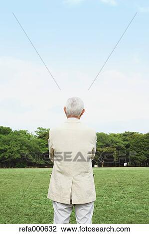 Senior adult Japanese man in a park View Large Photo Image Stock Image - Senior adult Japanese man in a park. Fotosearch