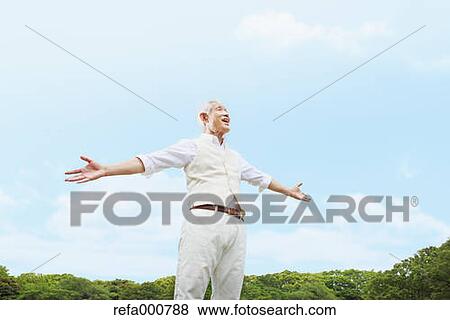 Senior adult Japanese man in a park View Large Photo Image Stock Photo - Senior adult Japanese man in a park. Fotosearch