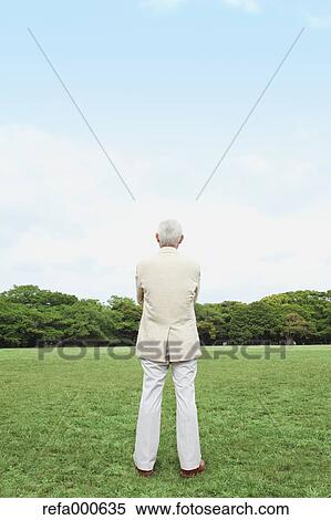 Stock Photography - Senior adult Japanese man in a park. Fotosearch