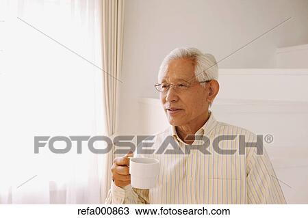 Senior adult Japanese man with coffee View Large Photo Image Stock Image - Senior adult Japanese man with coffee. Fotosearch
