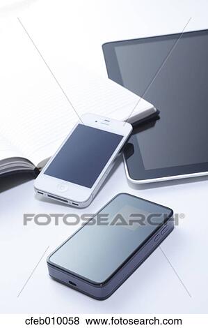 Smartphone and tablet View Large Photo Image Stock Photo - Smartphone and tablet. Fotosearch