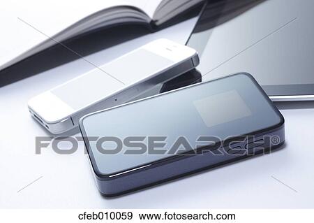 Smartphone and tablet View Large Photo Image Stock Photo - Smartphone and tablet. Fotosearch