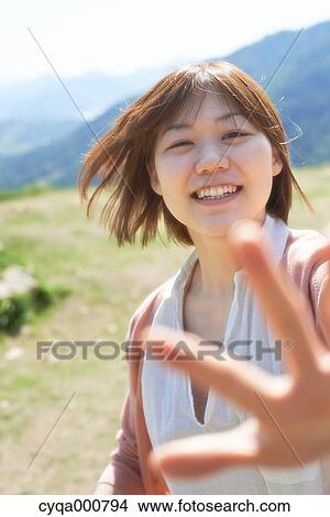 Young Japanese girl in the countryside View Large Photo Image Picture - Young Japanese girl in the countryside. Fotosearch
