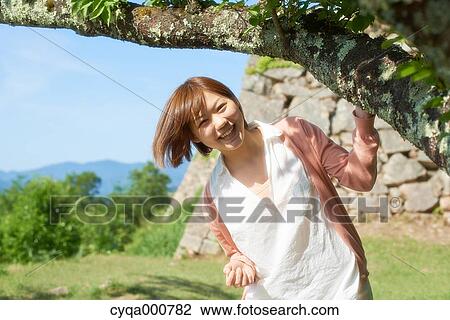Young Japanese girl in the countryside View Large Photo Image Stock Image - Young Japanese girl in the countryside. Fotosearch