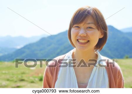 Young Japanese girl in the countryside View Large Photo Image Stock Image - Young Japanese girl in the countryside. Fotosearch