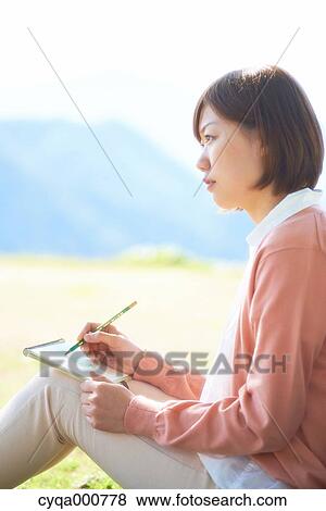 Young Japanese girl in the countryside View Large Photo Image Stock Photo - Young Japanese girl in the countryside. Fotosearch