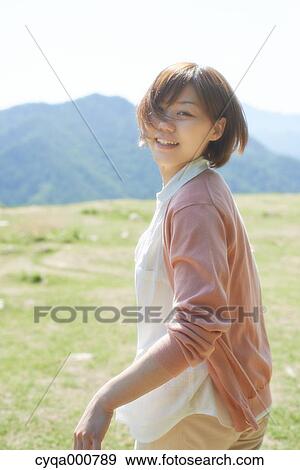 Young Japanese girl in the countryside View Large Photo Image Stock Photo - Young Japanese girl in the countryside. Fotosearch