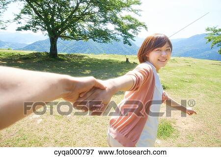 Stock Photo - Young Japanese girl in the countryside. Fotosearch