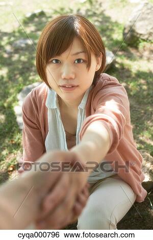 Young Japanese girl in the countryside View Large Photo Image Stock Photograph - Young Japanese girl in the countryside. Fotosearch