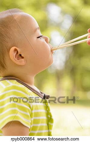 Young Japanese kid in a park View Large Photo Image Picture - Young Japanese kid in a park. Fotosearch
