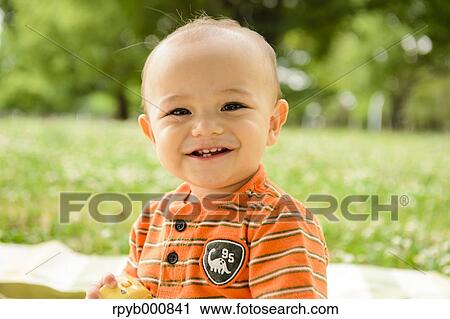 Young Japanese kid in a park View Large Photo Image Stock Image - Young Japanese kid in a park. Fotosearch