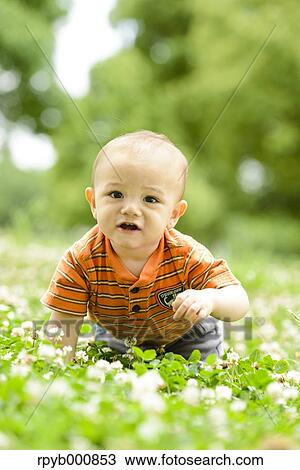 Young Japanese kid in a park View Large Photo Image Stock Image - Young Japanese kid in a park. Fotosearch