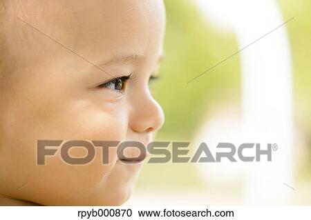 Stock Image - Young Japanese kid in a park. Fotosearch