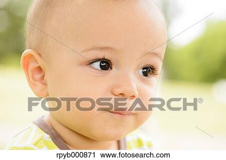 Young Japanese kid in a park View Large Photo Image Stock Image - Young Japanese kid in a park. Fotosearch