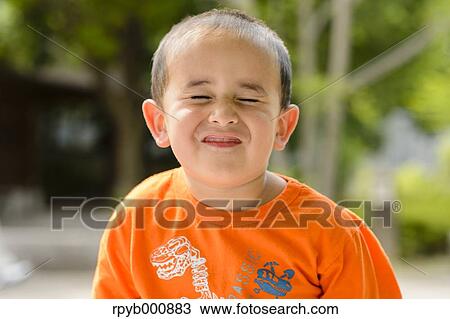 Young Japanese kid in a park View Large Photo Image Stock Image - Young Japanese kid in a park. Fotosearch