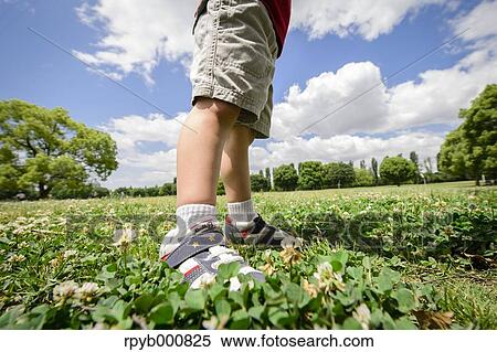 Young Japanese kid in a park View Large Photo Image Stock Photography - Young Japanese kid in a park. Fotosearch