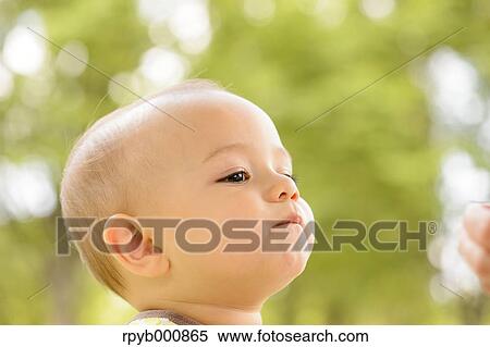 Young Japanese kid in a park View Large Photo Image Stock Photography - Young Japanese kid in a park. Fotosearch
